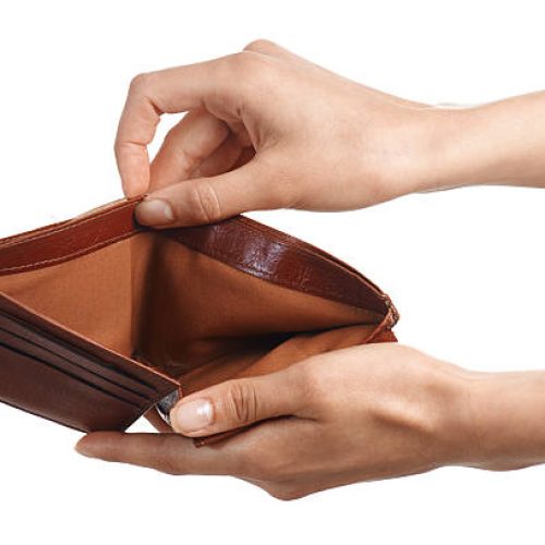 Hands holding and showing an empty wallet