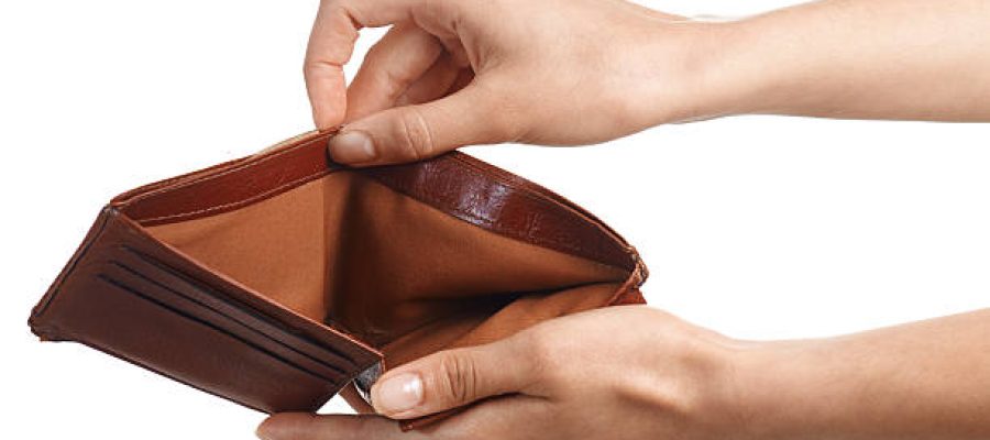 Hands holding and showing an empty wallet